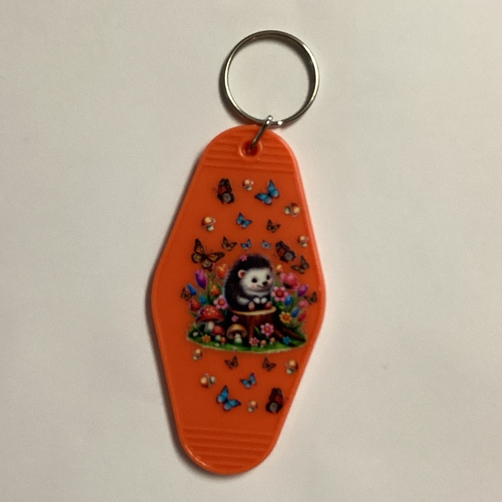 Orange Keychain with Cute Animal Design